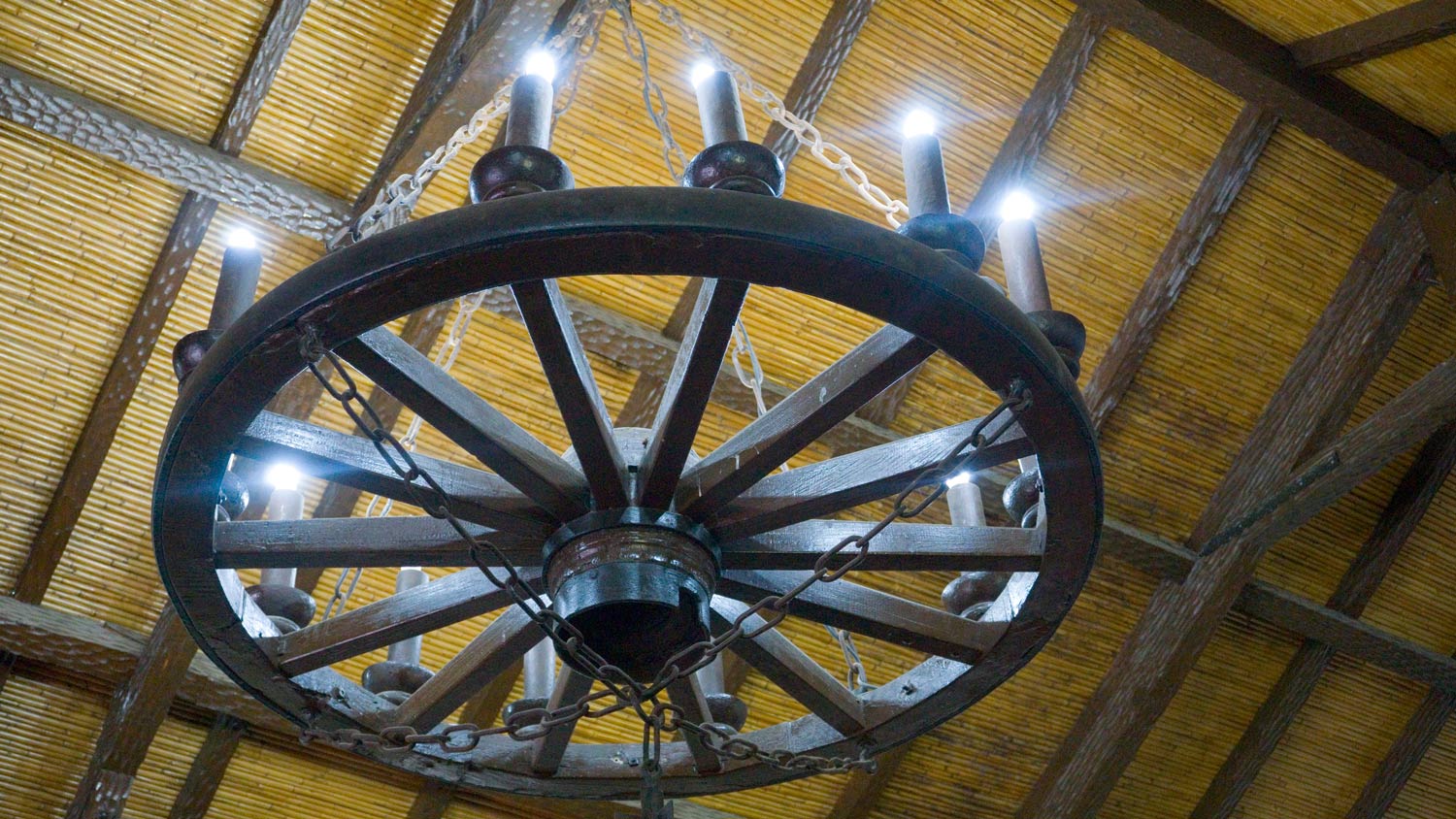 Antique wooden chandelier made with antique wagon