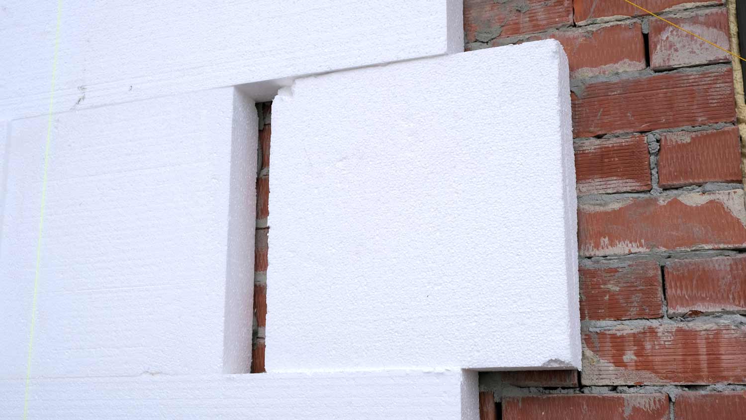 close up of wall with styrofoam insulation board 