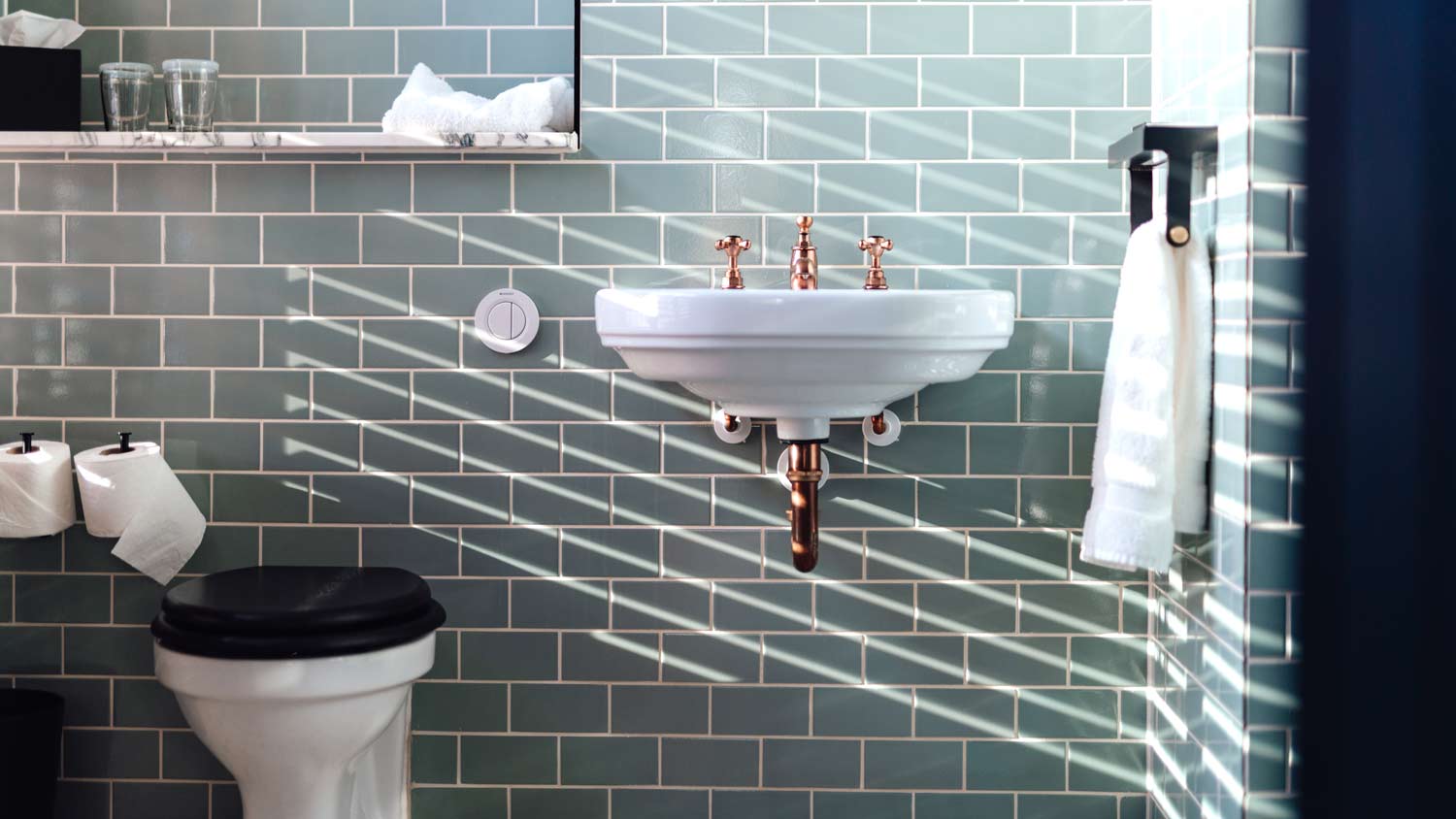 stylish bathroom with wall mounted sink