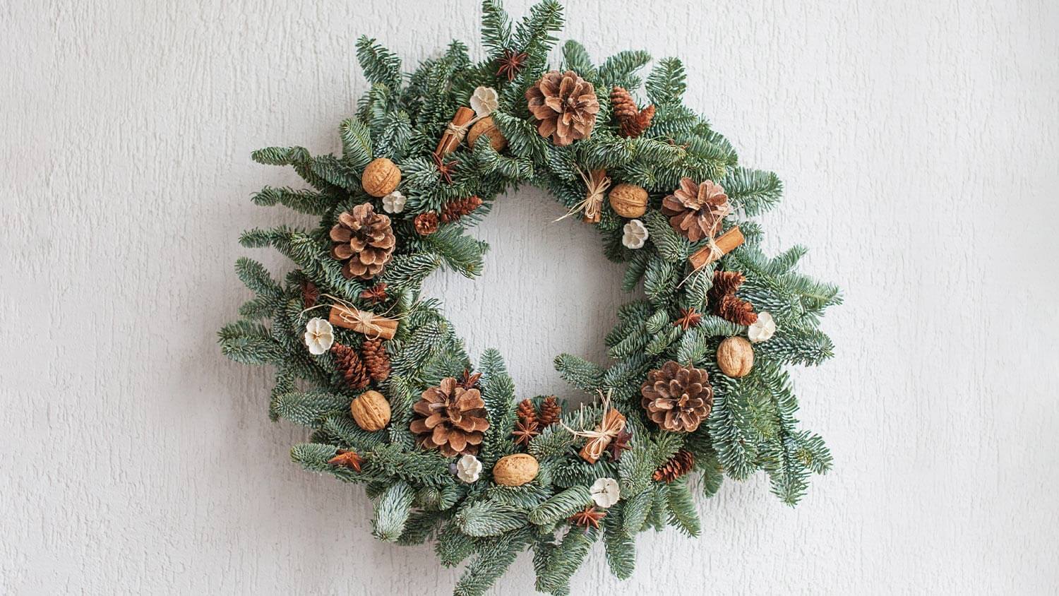 walnuts and cinnamon on green wreath