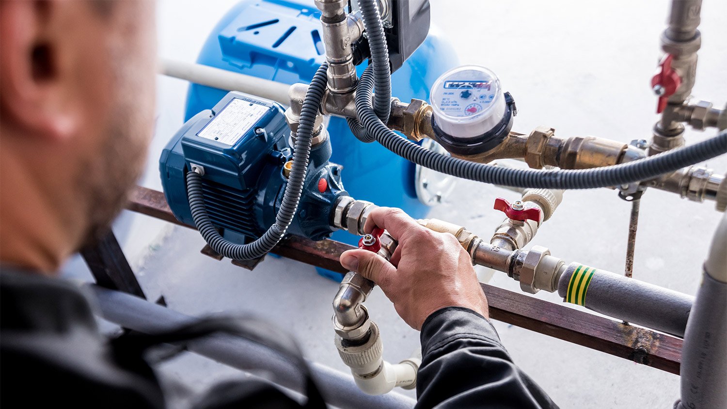 Technician checking water system