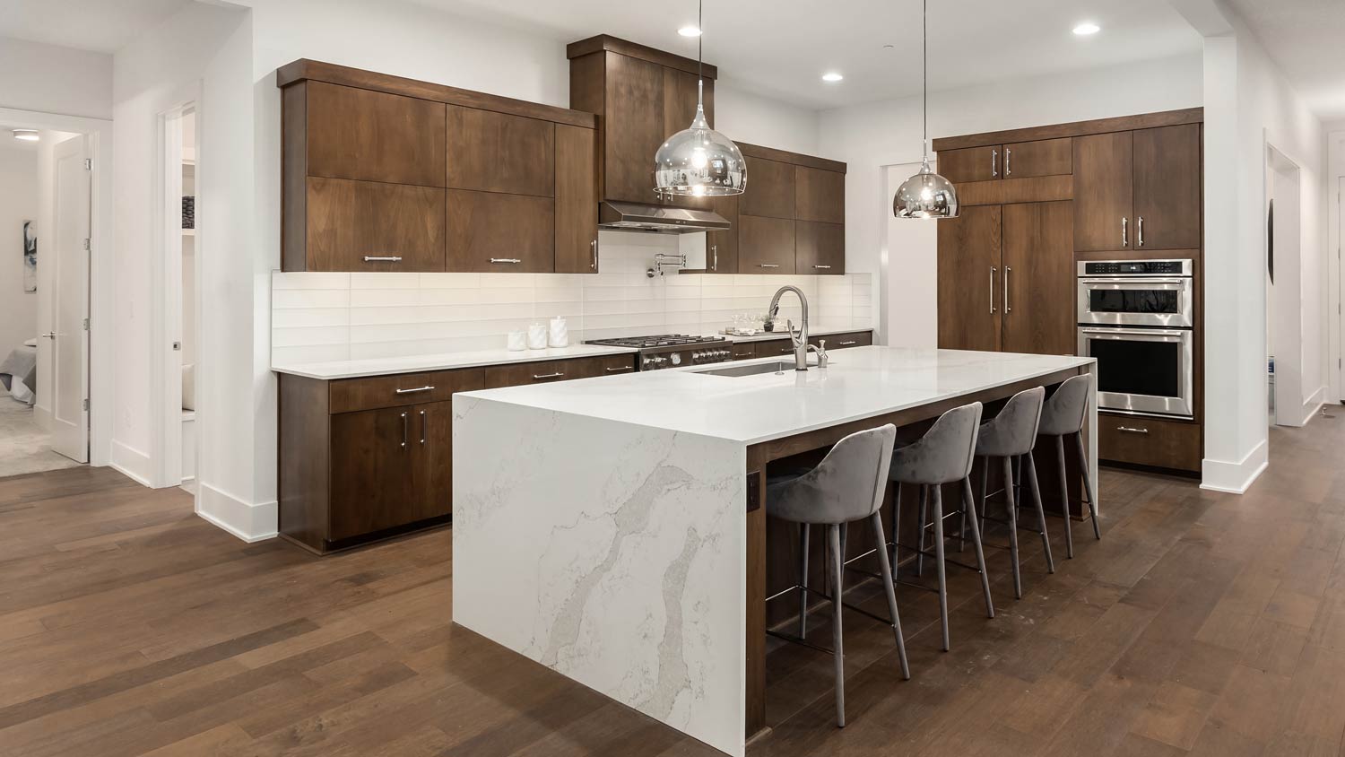 quartz waterfall kitchen island
