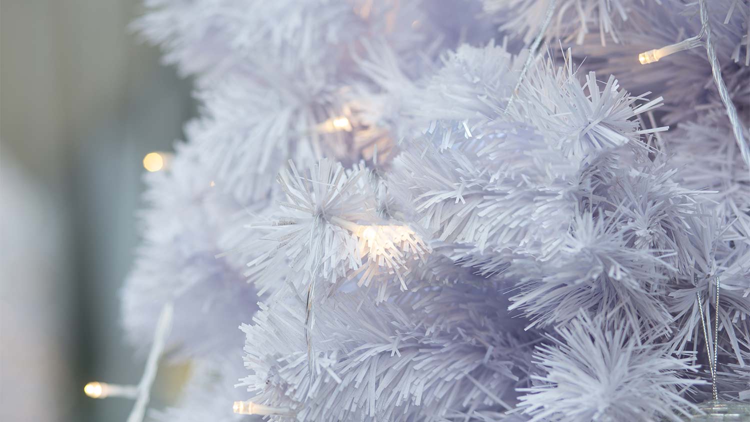 plain white christmas tree with lights