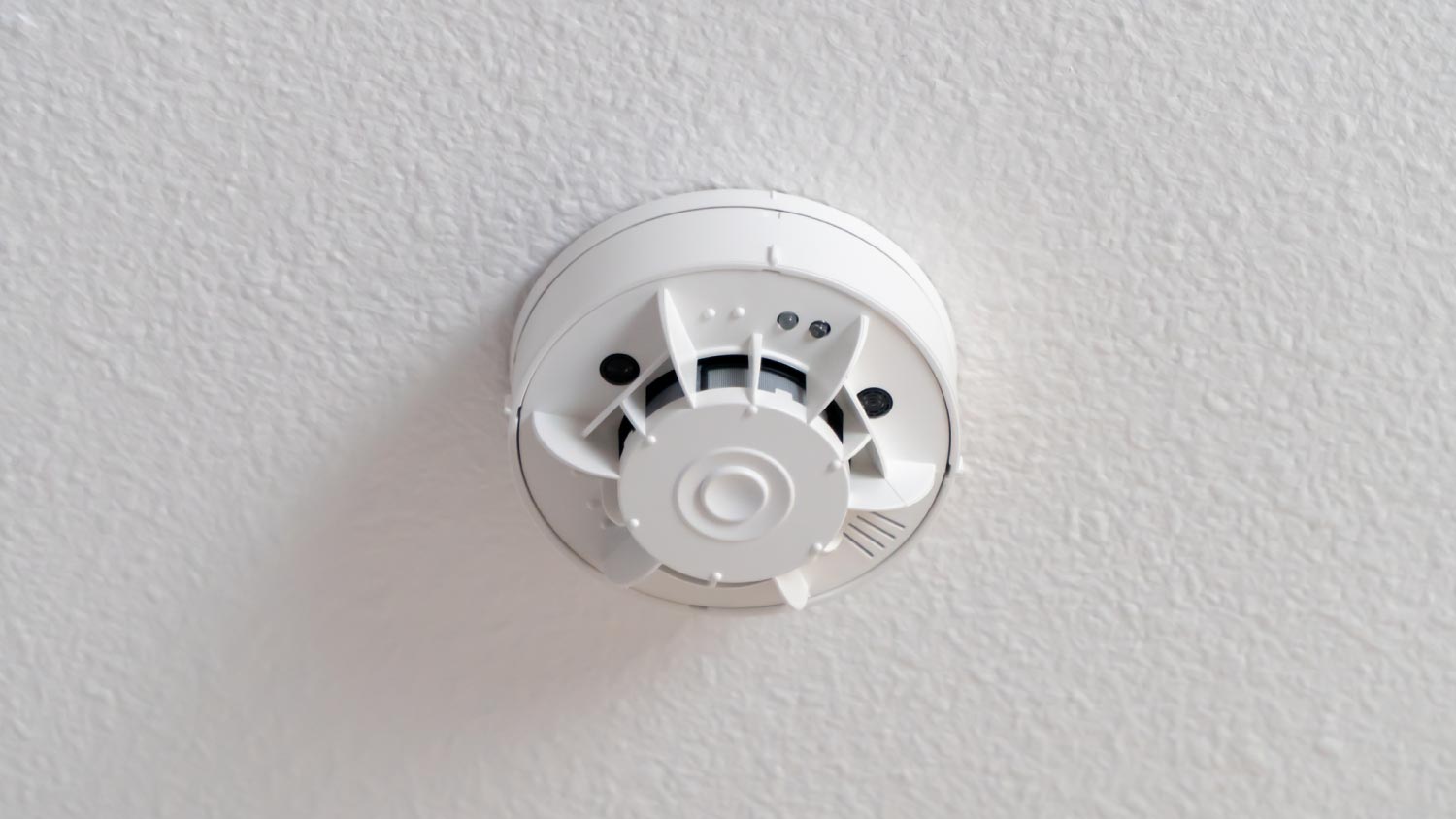 A white smoke detector