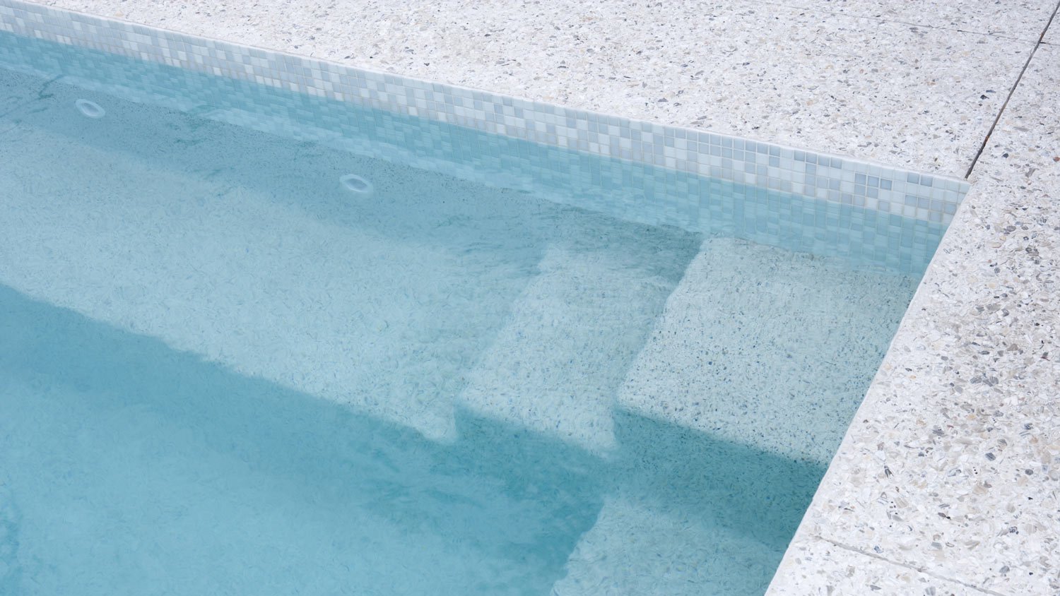 Detailed swimming pool shot with glass details.