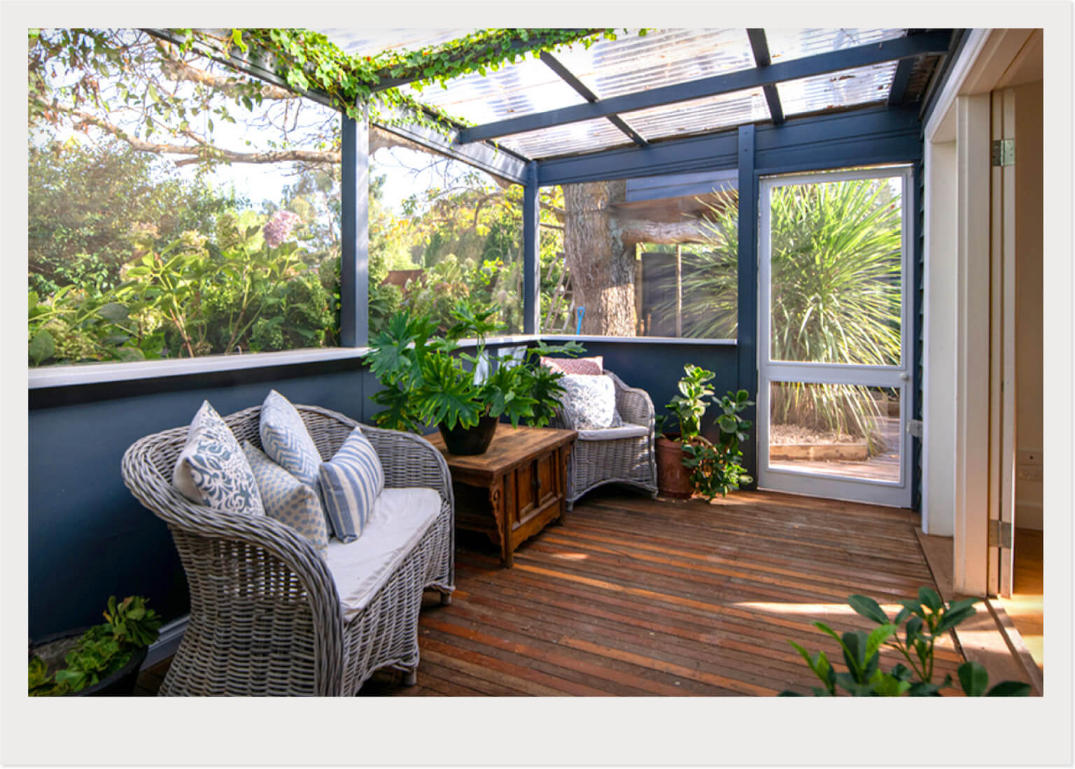 wicker furniture in sunroom