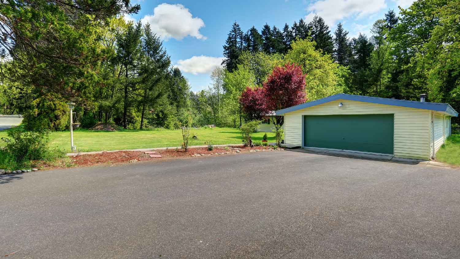 A wide asphalt driveway