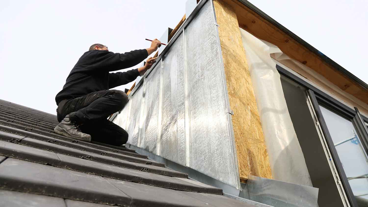 Worker framing dormer window