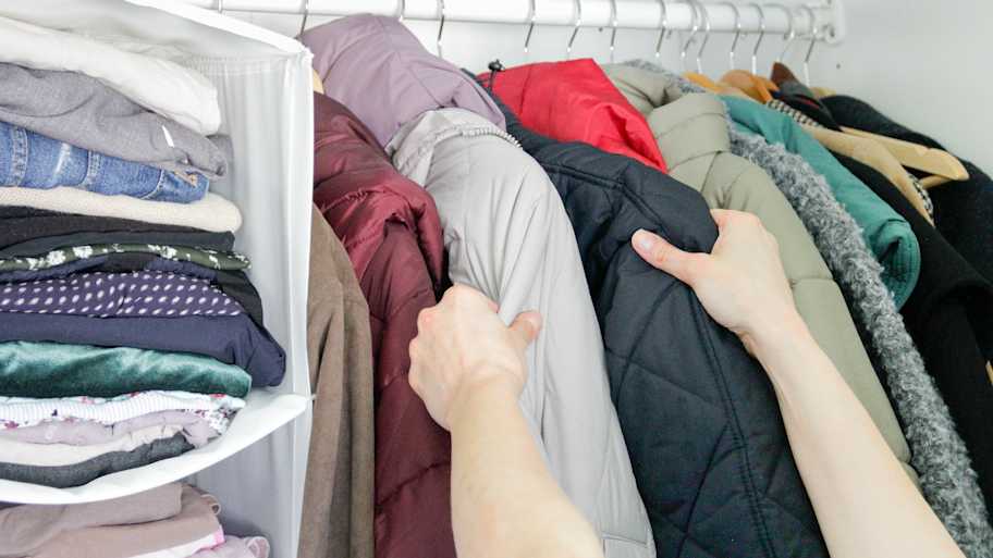 Closet full of winter clothing. 