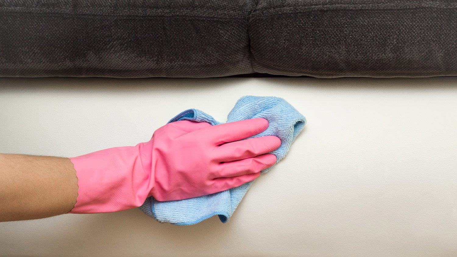 cleaning furniture with a rag