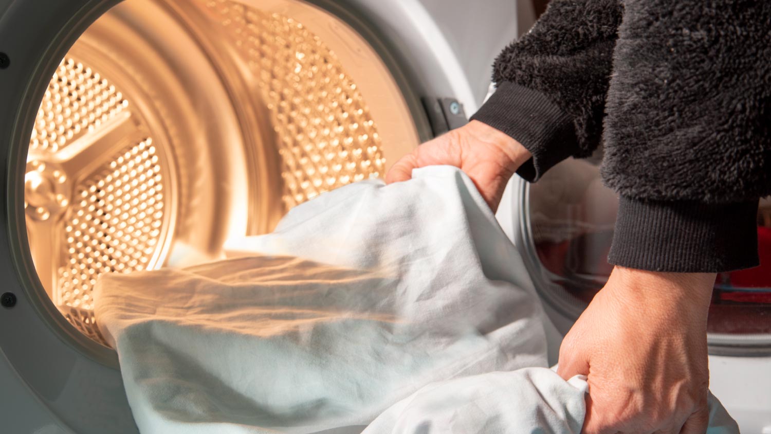 A woman doing her laundry