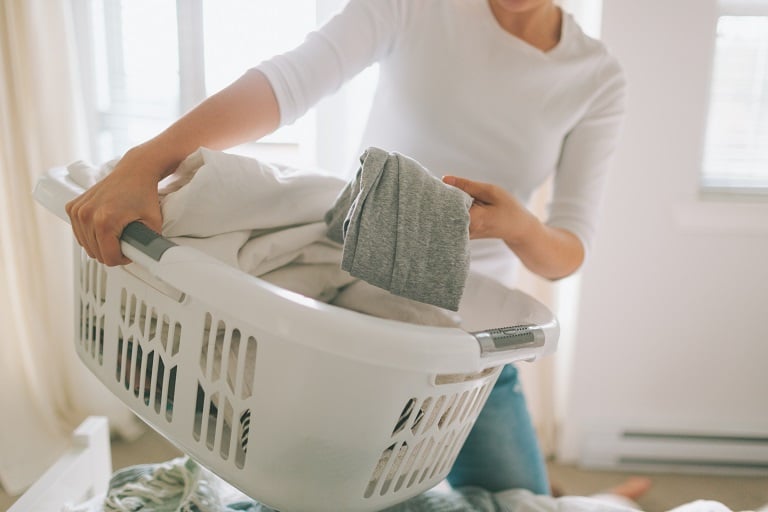 Woman folding laundry