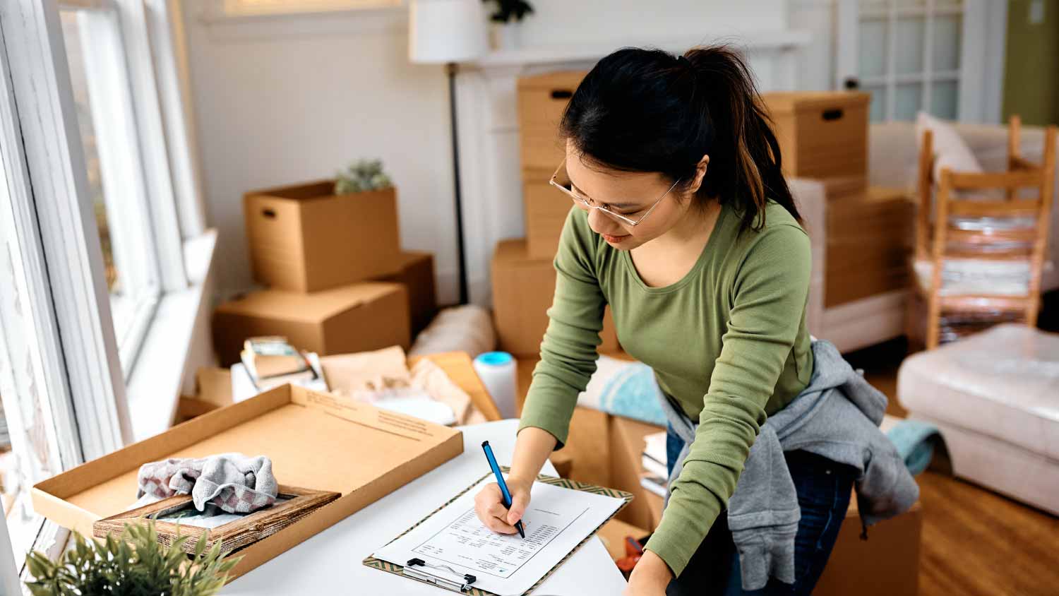 woman going through checklist