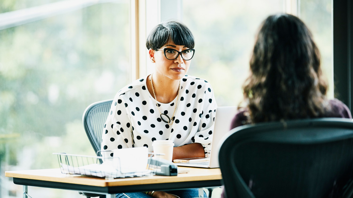 A woman negotiating with a potential buyer