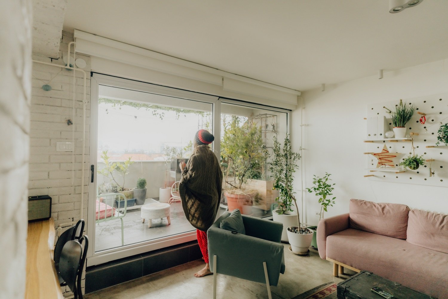 A woman looking through the window