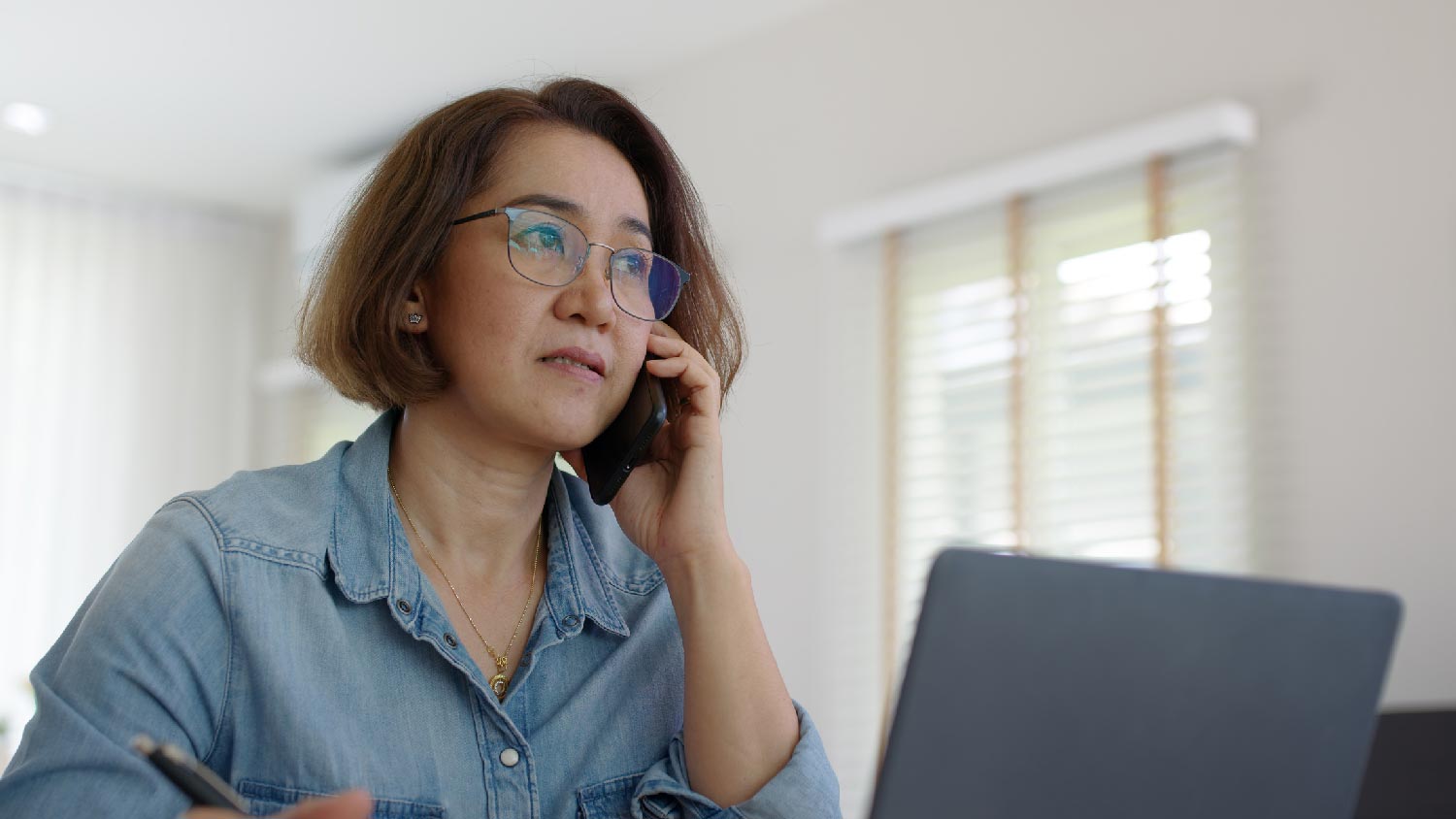 A woman talking on the phone