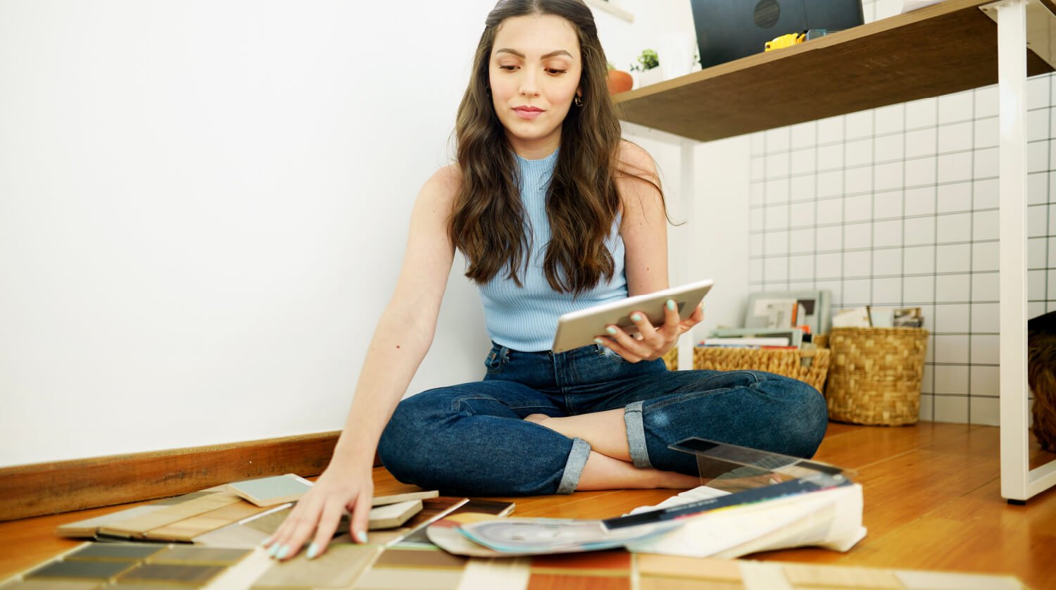 Woman looking at samples installing laminate flooring