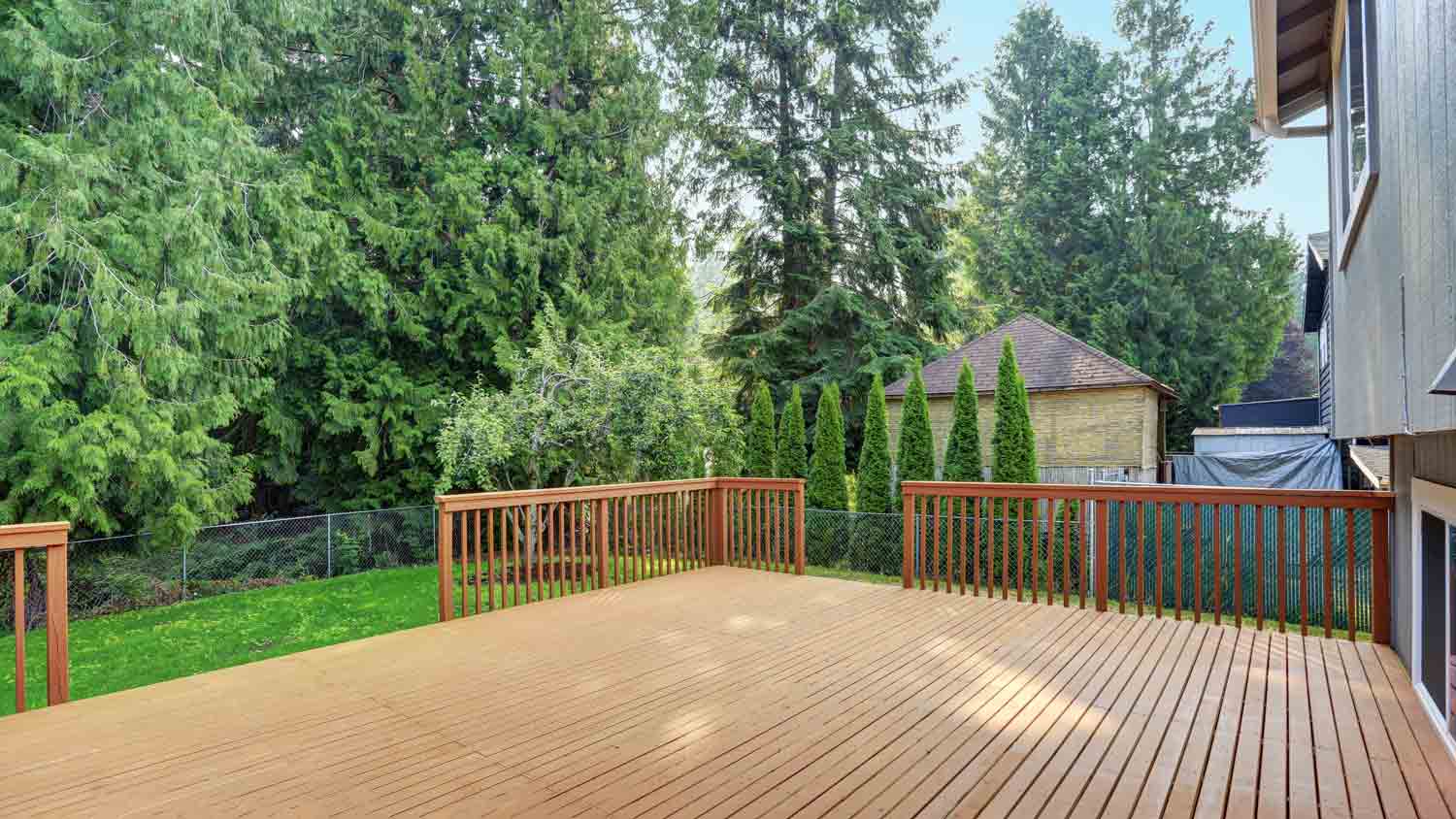 A spacious wood walkout deck