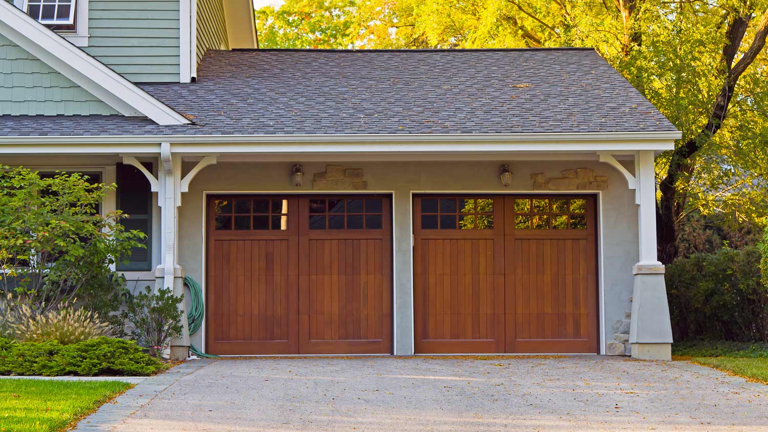 Two wooden garage doors