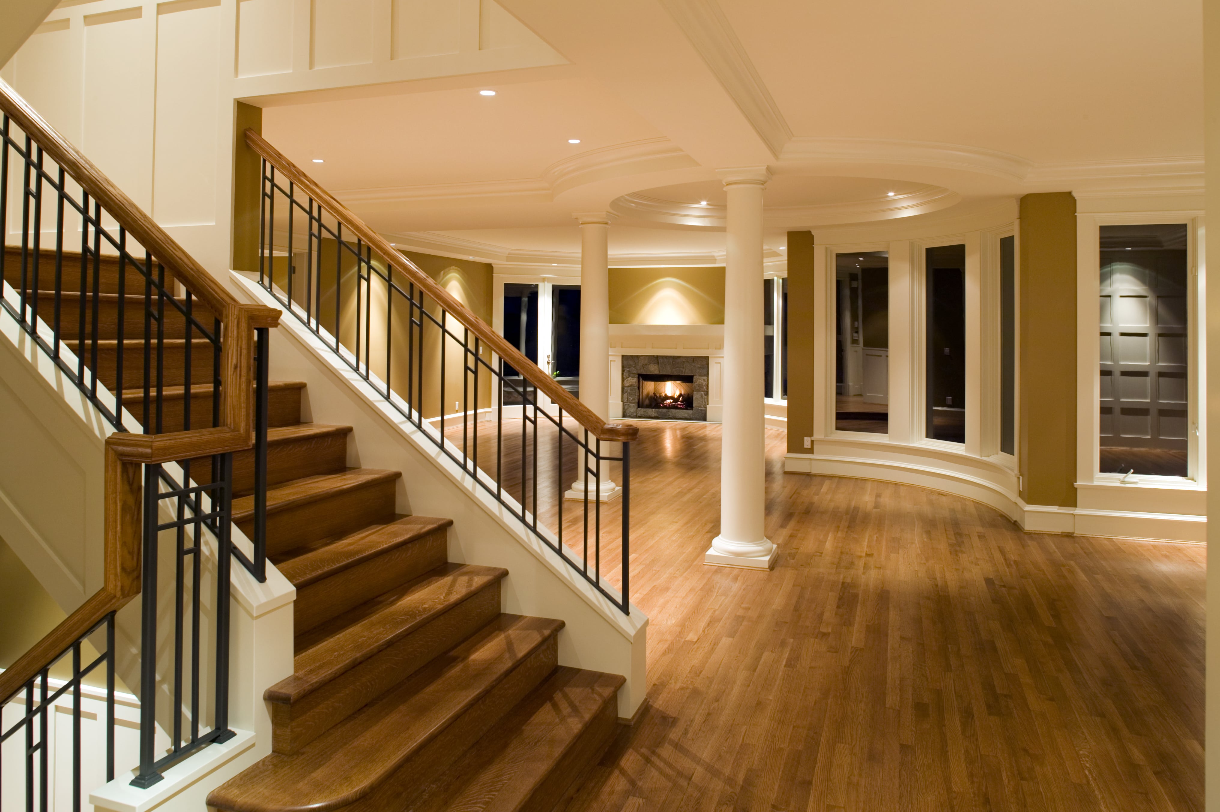 Grand wooden staircase in living room