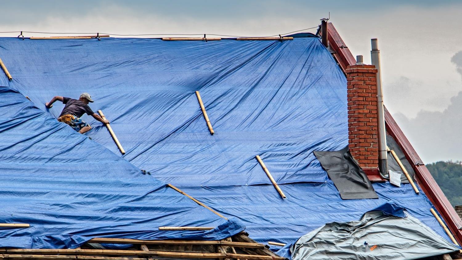 How to Tarp a Roof With Ease