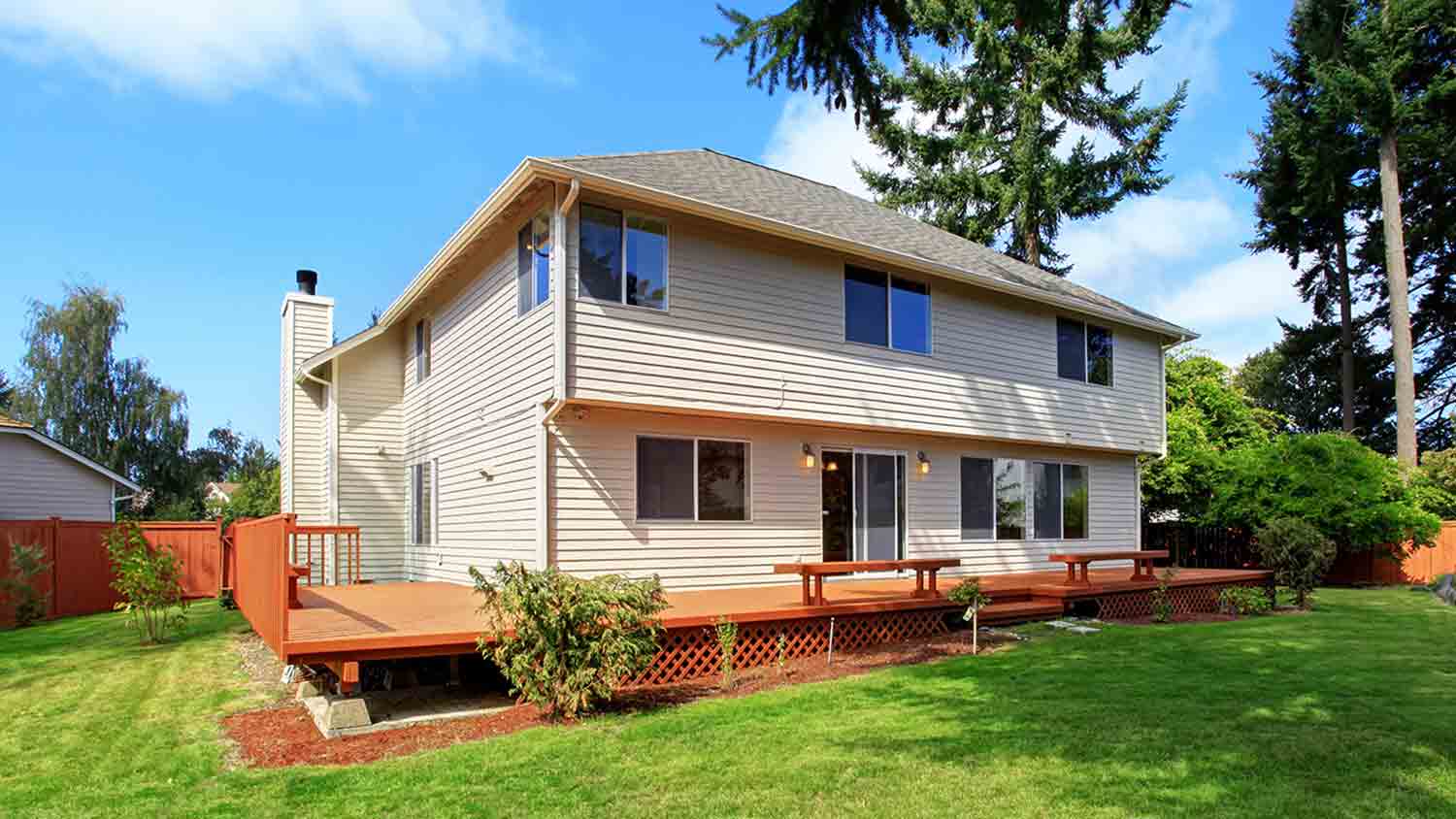 spacious house with wrap around deck 