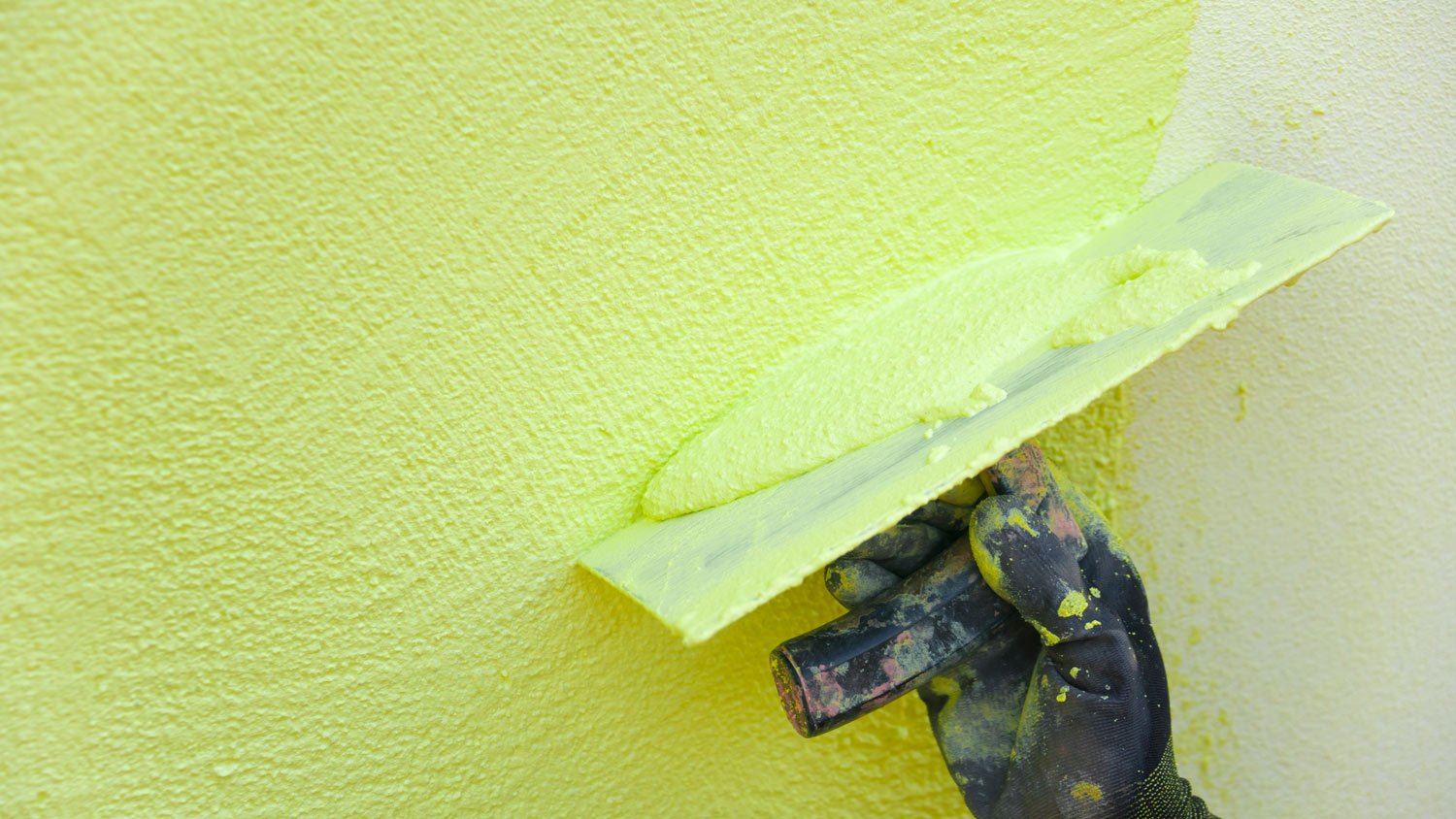 Yellow stucco paint