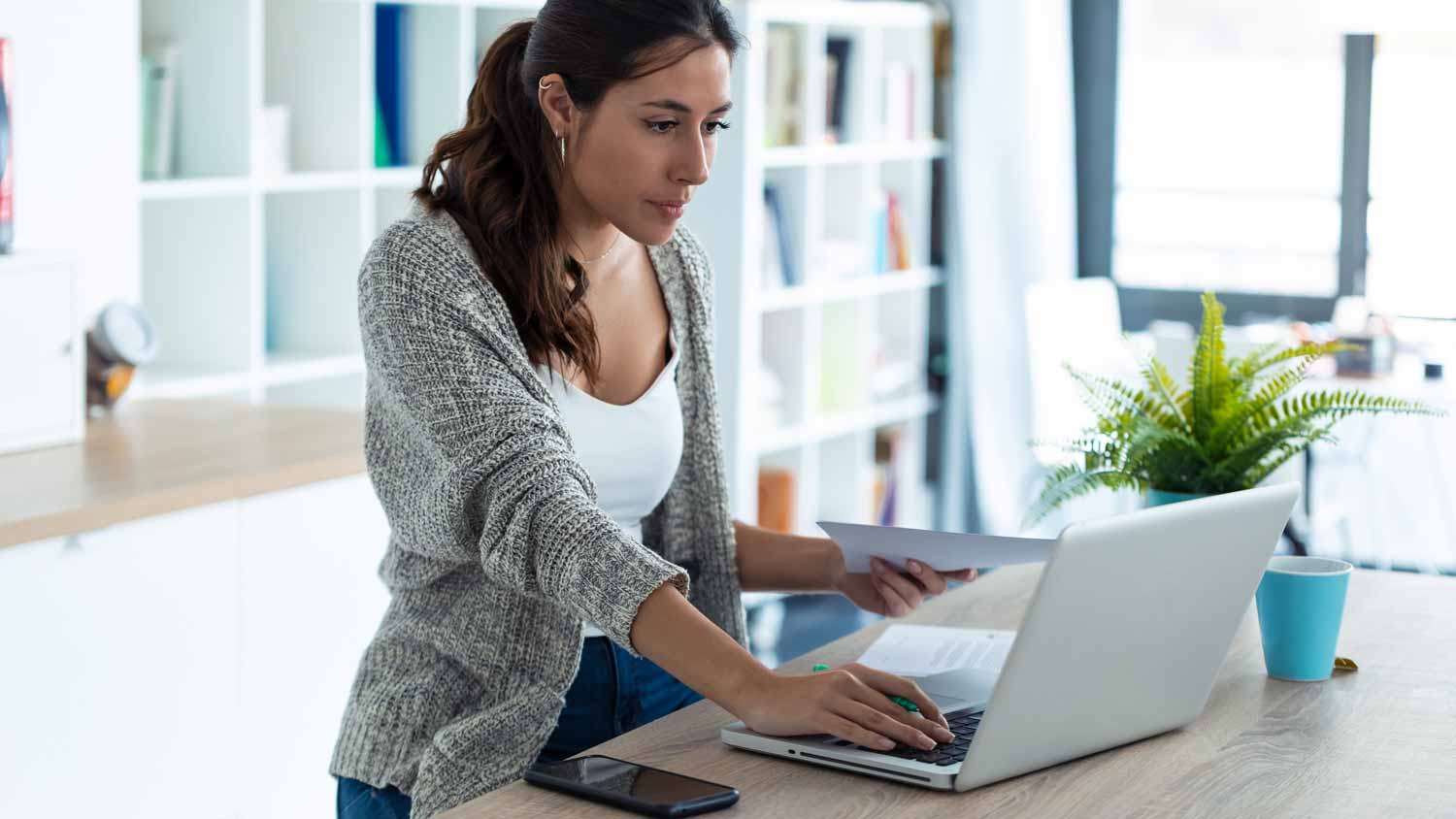 A young woman working on her laptop