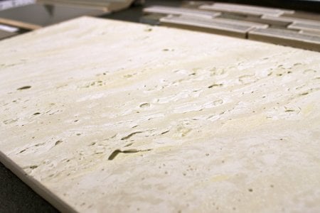 porcelain tile styled as a faux travertine tile