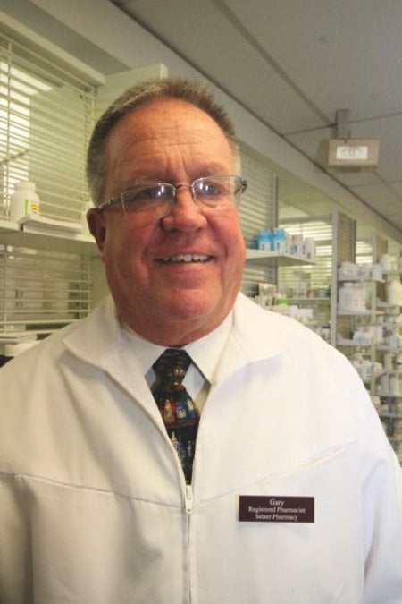 Pharmacist Gary Raines has been working at the St. Paul, Minn. family pharmacy for 47 years and running it for 23. (Photo by John Molene)