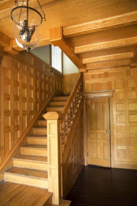 Tony Shockley and his crew painstakingly repaired or restored the home's historic feel, but retained the look of the front staircase. (Photo by Brandon Smith)