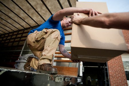Mover unloading boxes.