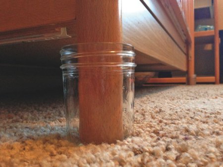 Parents concerned with scorpions can place crib feet in glass Mason jars, since bark scorpions can't crawl up glass. (Photo by Bulwark Exterminating)