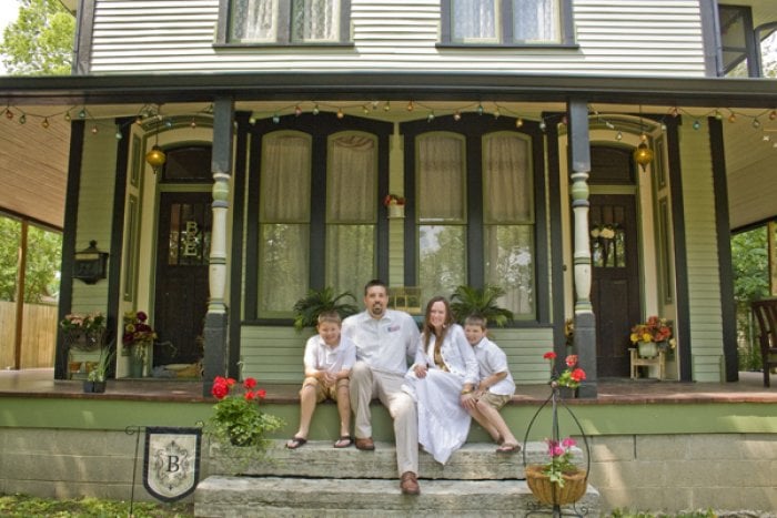 Scott and Cori Brown live in their restored home at 226 W. Madison St., Franklin, with their sons Gage, 9, (left) and Aiden, 7. (Photo by Brandon Smith)