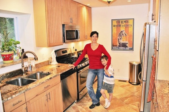 University City homeowner Julia Mariani, shown here with son Sam, says finding a contractor with the proper municipal license was important when she remodeled her kitchen. (Photo courtesy of Julia Mariani)
