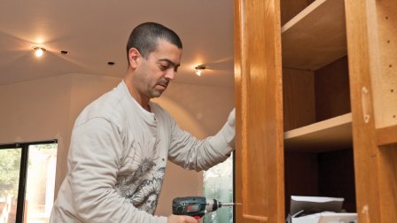 A professional can help reclaim old cabinets and make new contractor resurfacing cabinets