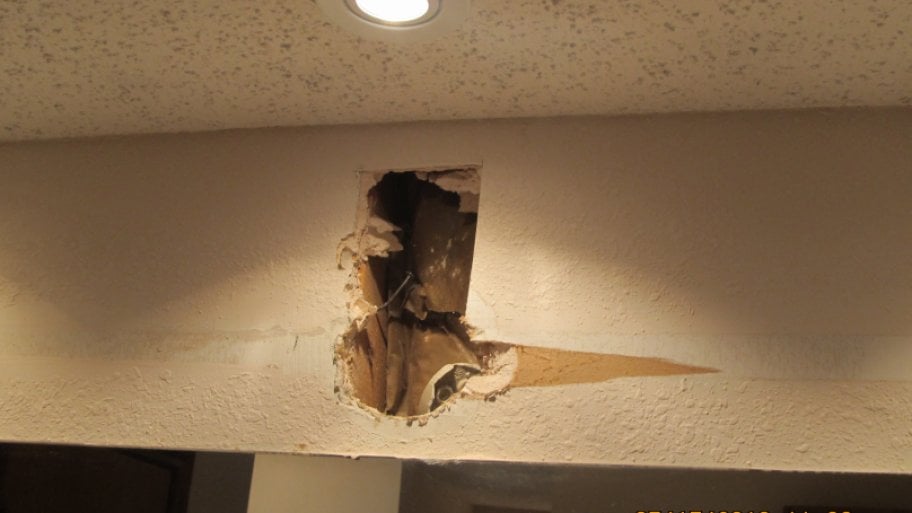 Hole in upper interior wall.