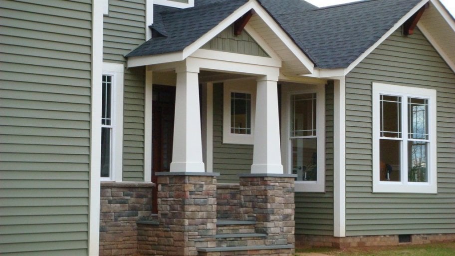 home exterior with brick porch