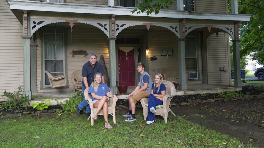 fender family portrait in front of their home
