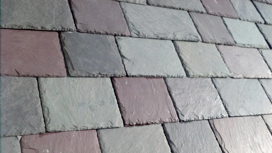 slate tile roofing material in grey and red tones